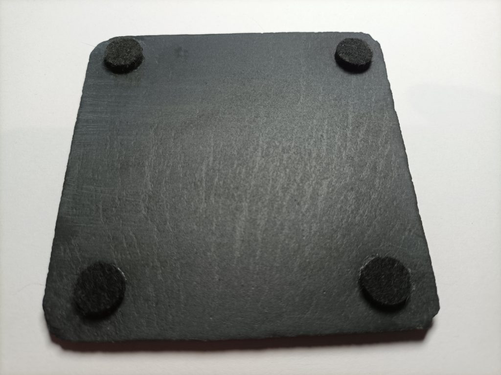Set of engraved slate coasters